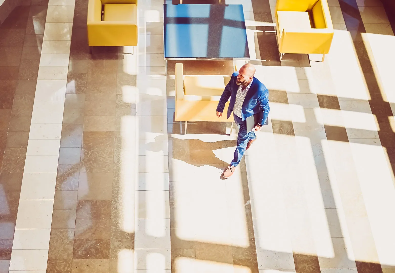 businessman walking in lobby