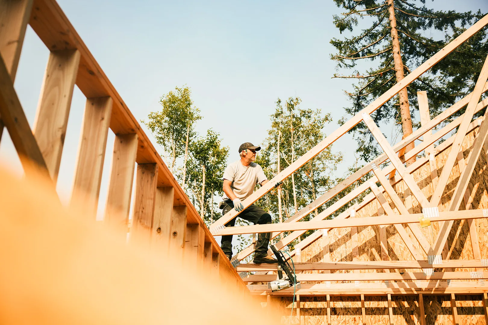 construction worker framing roof