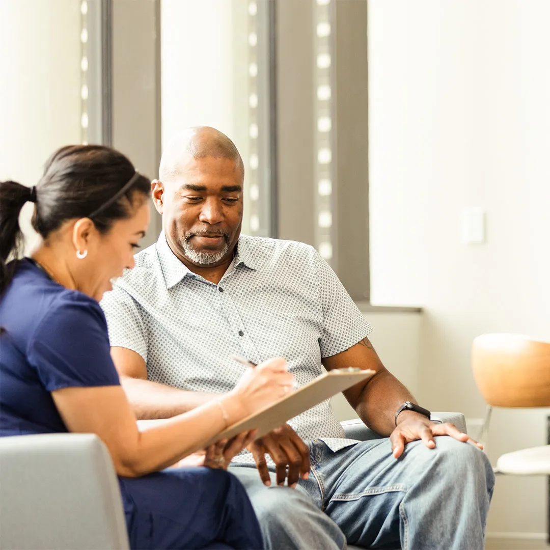 doctor and patient sitting together