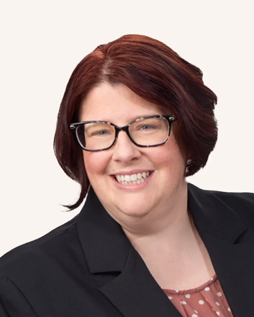 Headshot of a professional woman smiling