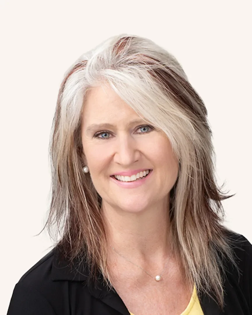 Headshot of a professional woman smiling